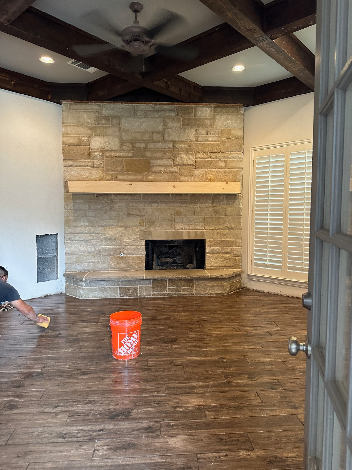 Stone Fireplace with Wood Mantel
